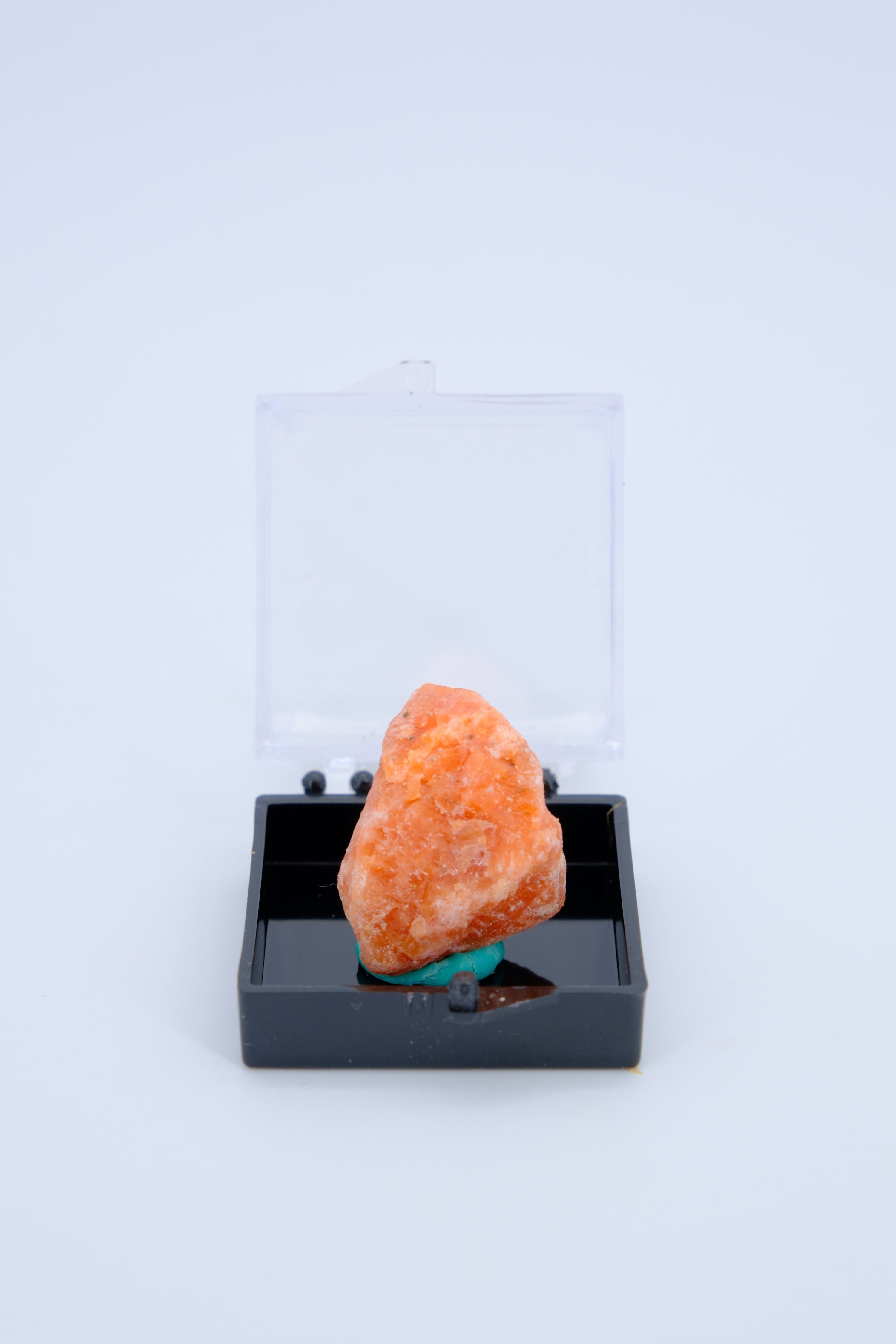 Radiant Treasures - A Collection of Vibrant Red and Orange Minerals